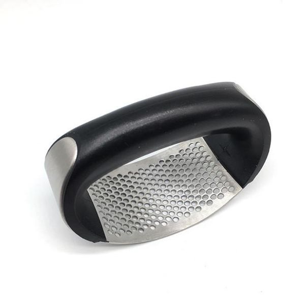 1. "NEW Portable Stainless Steel Garlic Press"  
Compact stainless steel garlic press  

2. "Garlic Chooper Hand Garlic Press"  
Handheld garlic chopper and press  

3. "Garlics Grinder Grater Cutter Slicer"  
Multi-functional garlic grinder and slicer  

4. "Kitchen"  
(少于5个单词，保留原文)  
Kitchen