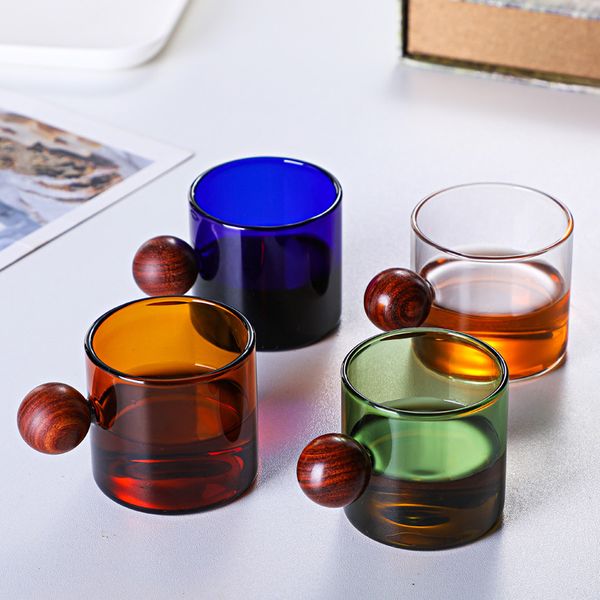 120ml glass mugs with wooden handles, ideal for both hot and cold beverages, featuring a transparent design for coffee or tea