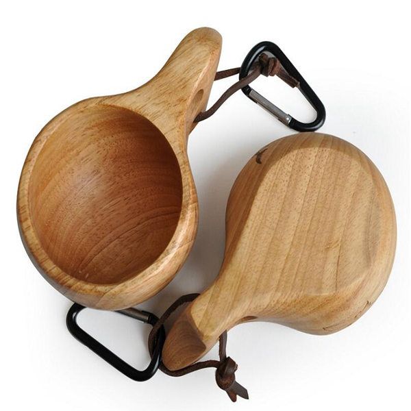 20 handcrafted Finnish Kuksa double-hole wooden cups for coffee, milk, or water, ideal as travel gifts
