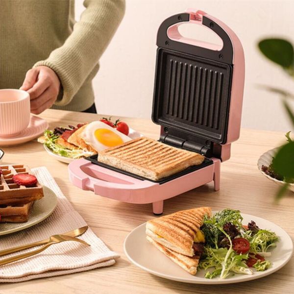 220V household electric waffle maker with non-stick surface, available in pink and red colors
