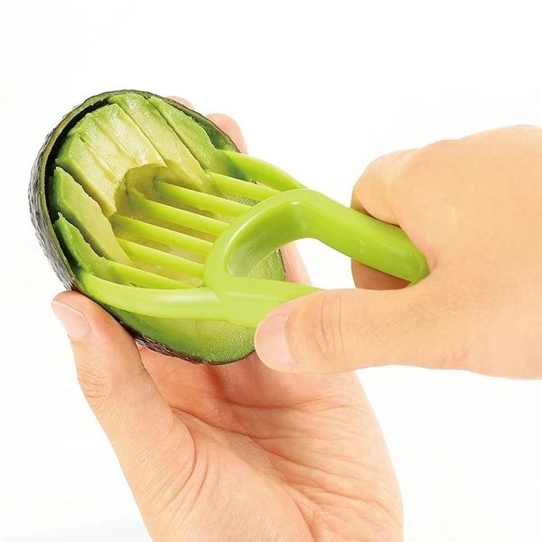 3-in-1 avocado slicer with corer, peeler, cutter and pulp separator, plus a plastic knife for kitchen use