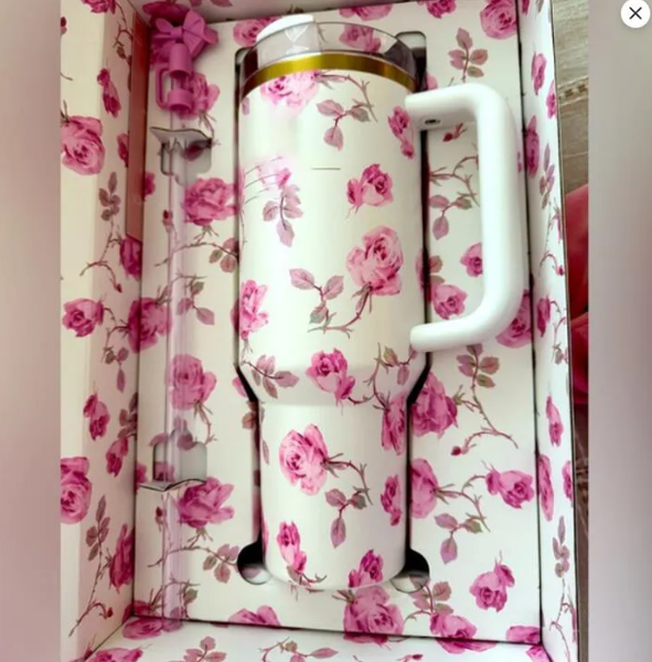 40oz stainless steel tumbler with silicone handle, lid, and straw in pink rose and blue magnolia holiday designs