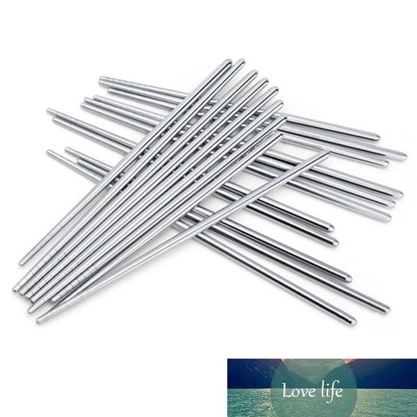 5 Pairs/Set of sleek stainless steel round chopsticks in a stylish Chinese design, lightweight and healthy for dining