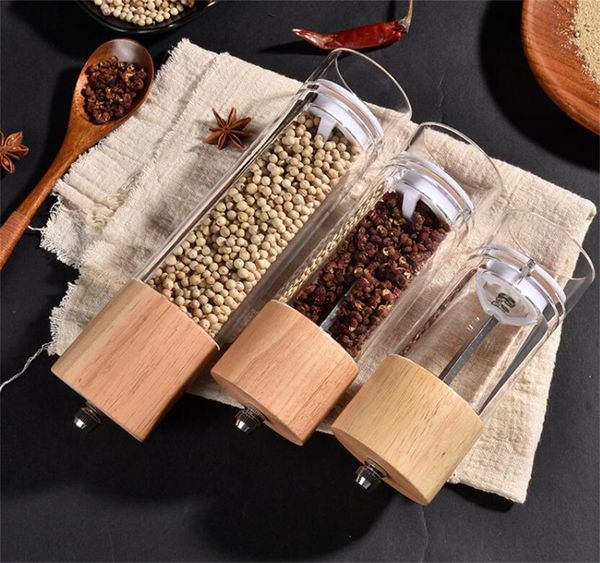 Acrylic salt and pepper mills with adjustable ceramic grinding mechanism, available in 8, 6.5, and 5.5-inch wooden shaker sizes
