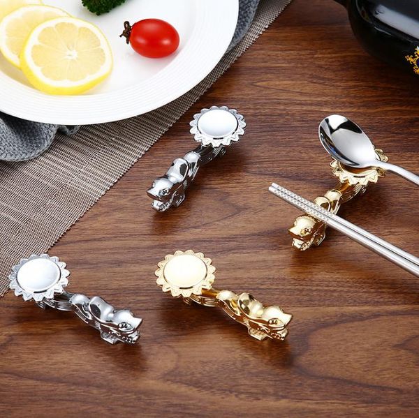 Alloy and gold dragon-shaped chopstick holders for table decor