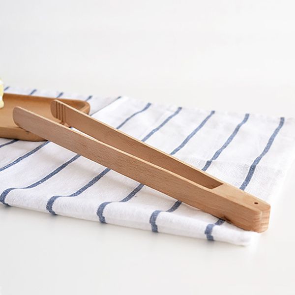 Bamboo BBQ tongs for serving salad, bread, and food during cooking