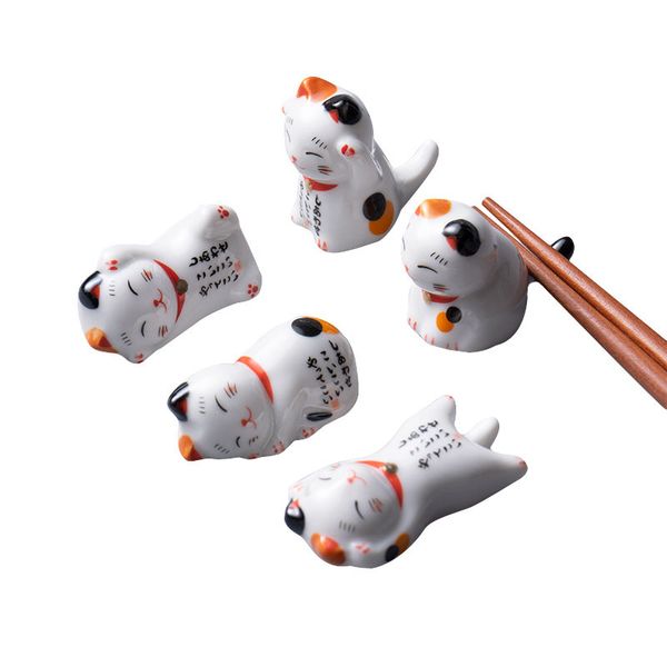 Ceramic chopstick rest featuring a lucky Maneki Neko cat design for stylish kitchen decor