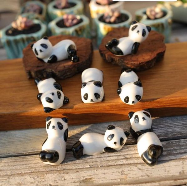 Ceramic chopstick stand with panda design, also holds spoons, forks, and knives for table decoration