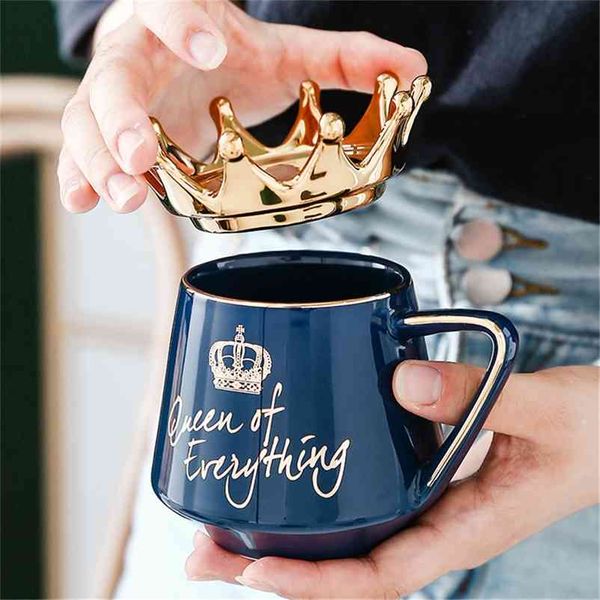 Ceramic coffee mug featuring a crown lid, spoon, and elegant design, perfect as a gift for wives or girlfriends