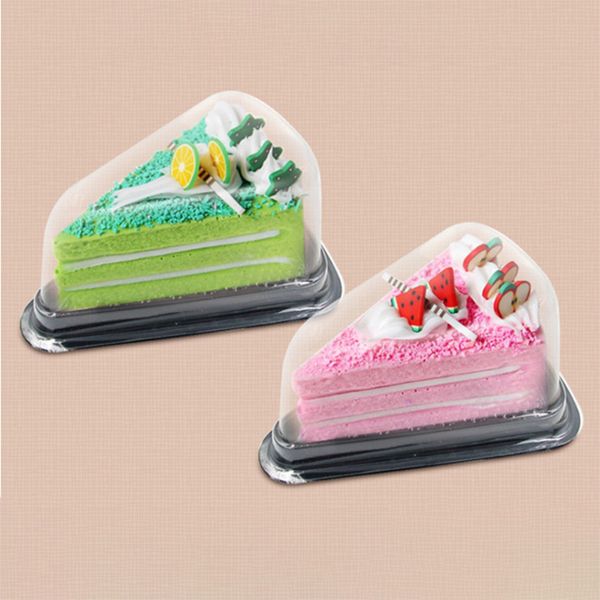 Clear plastic triangular containers for holding cheesecake, pie, and sandwich slices
