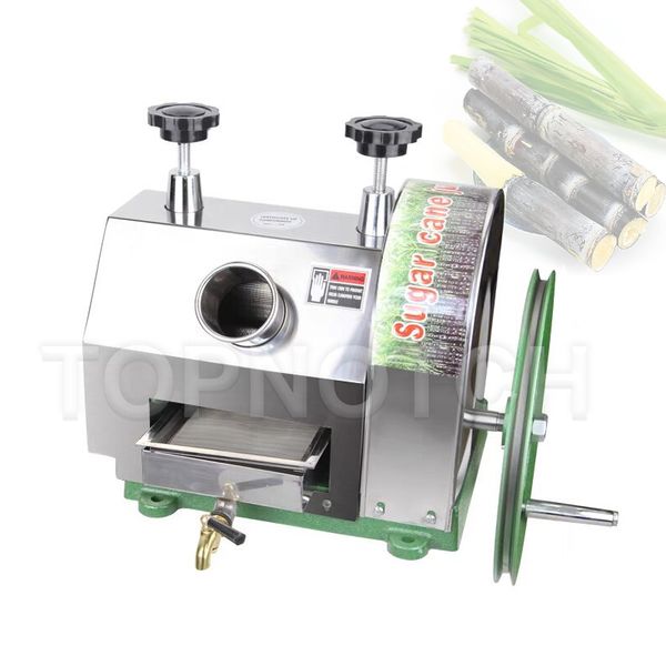 Commercial manual sugarcane juicer with hand wheel for grinding and pressing cane to extract juice