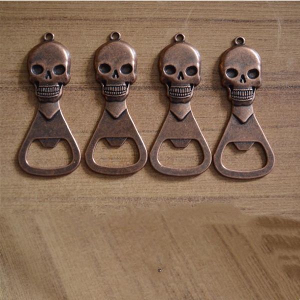 Compact skull-shaped bottle openers, mini keychain tools for beer and wine bottles in bronze