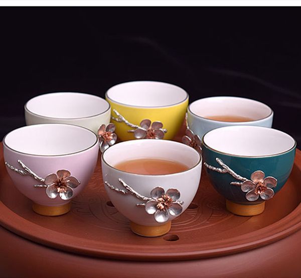 Creative Ceramic Tea Cup with Floral Design in Blue, Yellow, White, and Pink