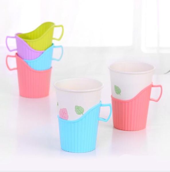 Disposable paper cup holder plastic anti-heat insulation cup sleeve  

Rewritten:  
Plastic heat-resistant disposable cup sleeve holder for paper cups