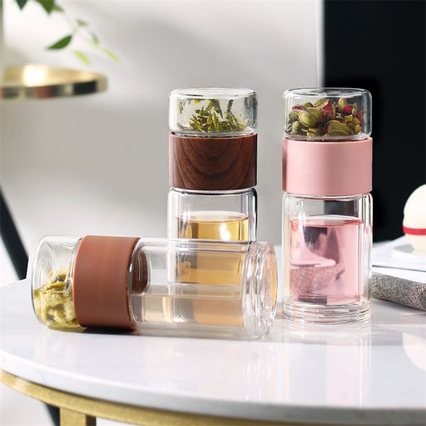 Double-walled glass tumbler with stainless steel tea infuser and floral design