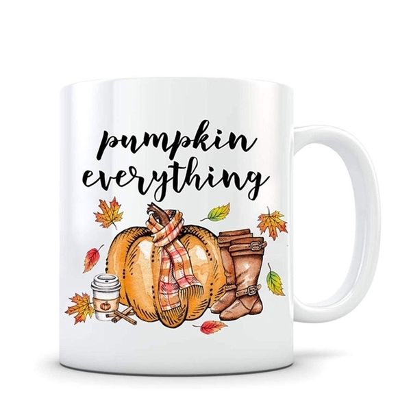 Fall-themed coffee mug with pumpkin design, perfect for autumn and as a hostess gift, made of white ceramic