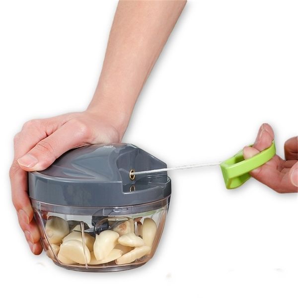 Garlic press for mincing chili, meat, and onions in the kitchen
