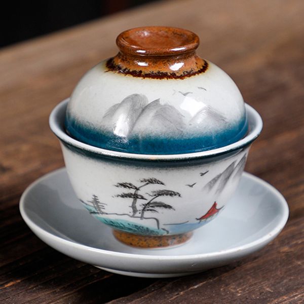 Handcrafted antique wood-fired Sancai Gaiwan tea bowl with hand-painted designs, a Japanese-style ceramic tea tureen