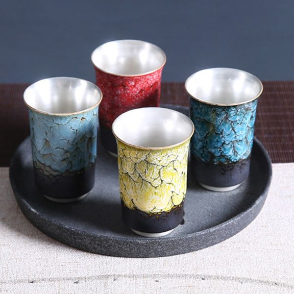 Handcrafted gilded silver tea cup featuring seasonal kiln changes, perfect for year-round use and home decoration