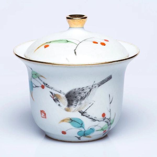 Hand-painted antique kiln ceramic tea set featuring bird designs, includes gaiwan and cup with lid for tea ceremonies