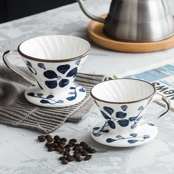 Hand-painted ceramic coffee dripper with a detachable stand, perfect for brewing 1-4 cups of pour-over coffee