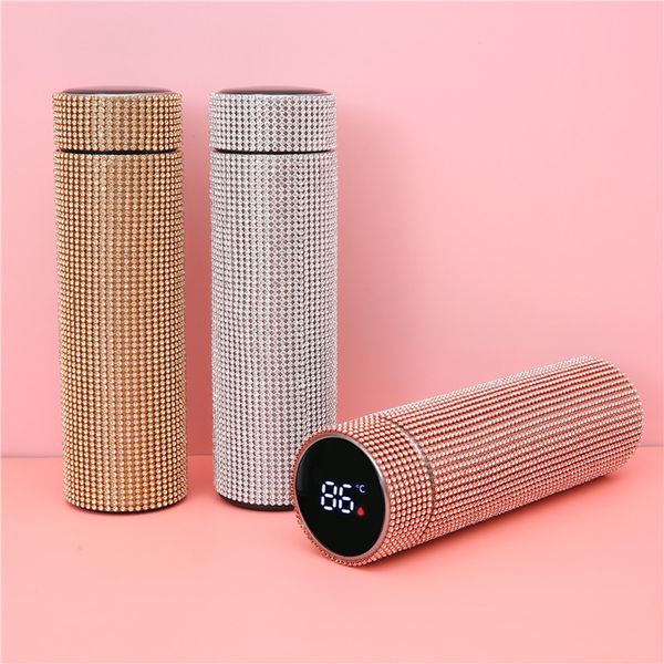 Insulated stainless steel tumbler with LED temperature display and touch screen, adorned with rhinestones