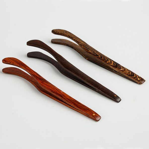 Kung Fu Tea's wooden tea clip for food toast salad tongs and tea tweezer tools  

Wooden tea clip from Kung Fu Tea for handling food toast salad tongs and tea tools