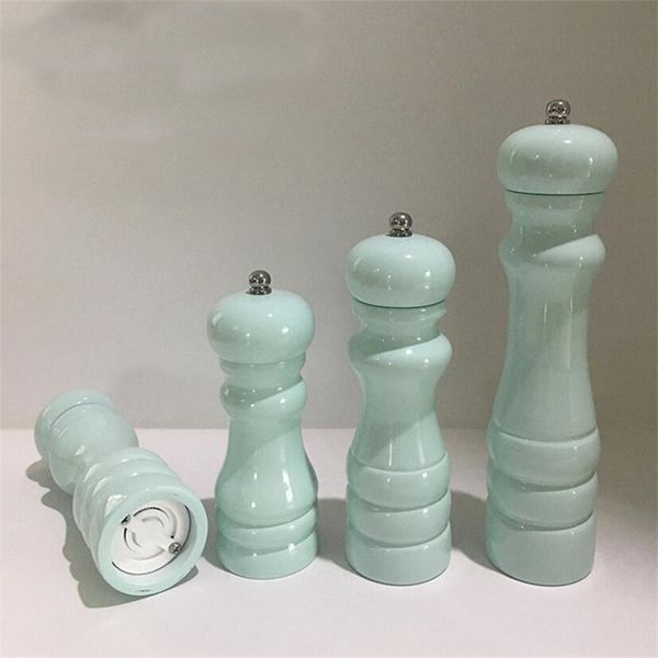 Manual pepper grinder mill in light green spray finish, crafted from rubber wood