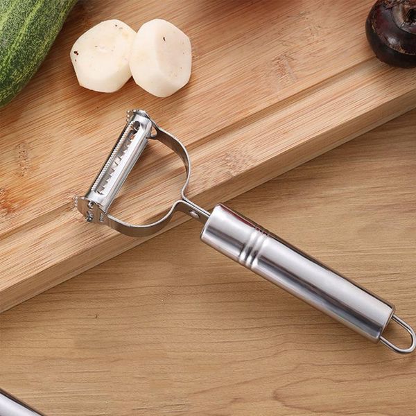 Multifunctional stainless steel peeler for vegetables like potatoes, cucumbers, and carrots, featuring dual slicing and grating functions