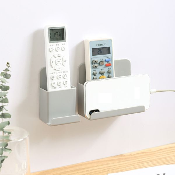 Multipurpose single-piece wall-mounted remote control holder for home storage in gray PP material