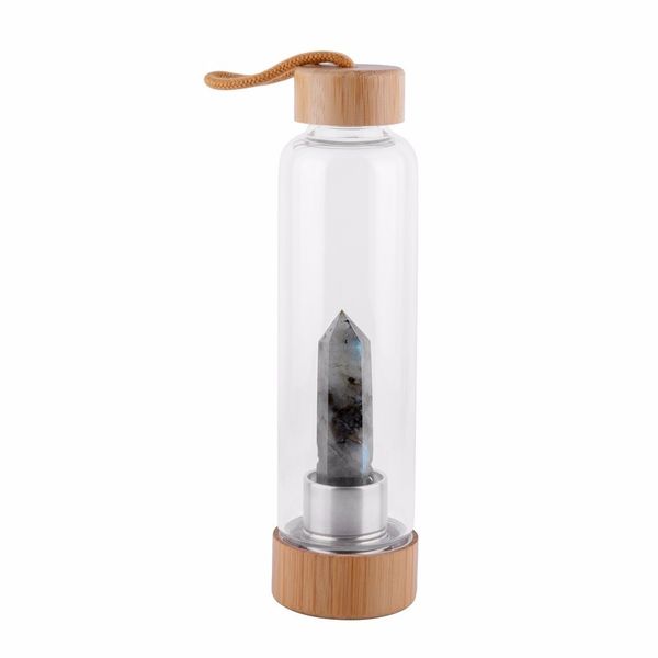Natural crystal water bottle with wooden cover for healing and elixir purposes