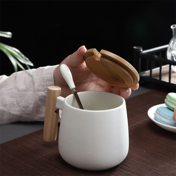 Nordic-inspired ceramic coffee mugs with wooden handles, featuring large capacity, included spoon and lid, perfect for home or office beverages