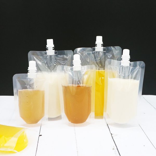 Plastic spout pouches for storing and dispensing beverages like juice, wine, milk, and coffee