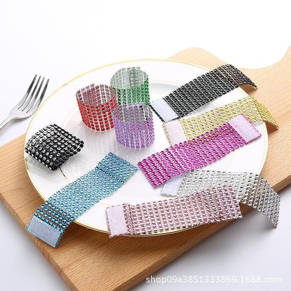 Rhinestone napkin rings made of plastic with a mesh design, perfect for weddings, hotels, and table decor