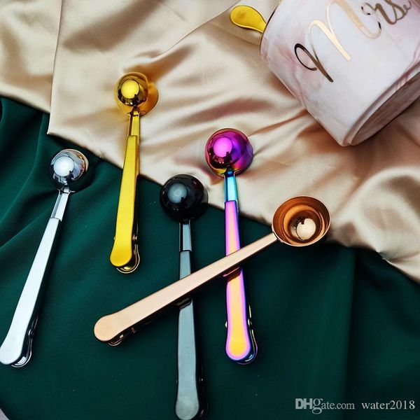 Stainless steel coffee scoop with sealing clip, available in 5 colors for kitchen, baking, seasoning, milk, and ice cream use