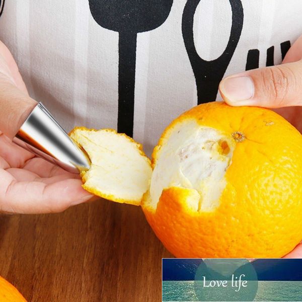 Stainless steel nail guard sleeve for safe vegetable peeling and hand protection in the kitchen