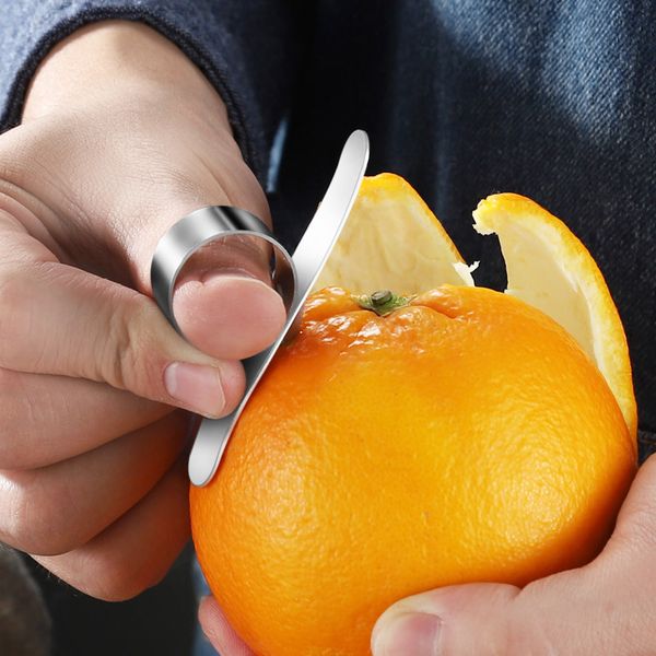 Stainless steel orange peeler with easy-open ring design for effortless citrus skin removal, lemon paring, and slicing