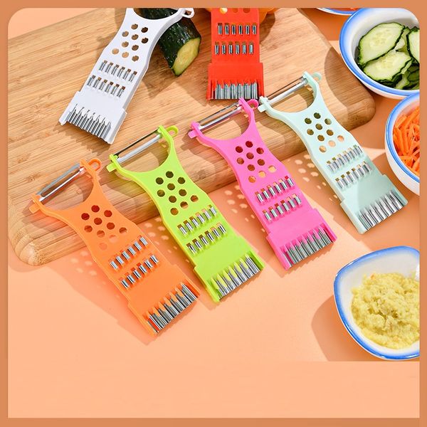 Stainless steel peeler and grater for efficient vegetable and fruit preparation

Manual kitchen slicer for cucumbers and other vegetables

Compact fruit and vegetable peeler with shredding function

Essential stainless steel kitchen tool for slicing and peeling

Multi-functional vegetable cutter for efficient food prep

Handheld kitchen accessory for peeling and grating vegetables

Stainless steel vegetable shredder with peeling capability

Compact manual slicer for cucumbers and other produce

Efficient kitchen tool for peeling and slicing vegetables

Stainless steel peeler and grater for professional food prep