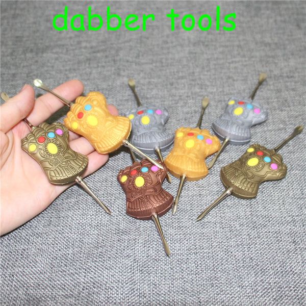 Stainless steel wax dabber tool with PVC stickers for dry herb vaporizer pens and glass globe tanks, shipped via DHL