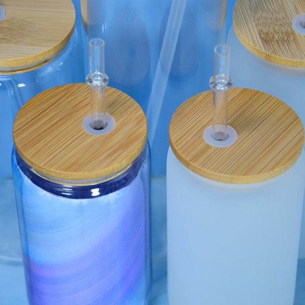 Sublimation-ready glass beer mugs and tumblers in 12oz and 16oz sizes featuring bamboo lids with reusable straws, perfect for iced coffee or drinks