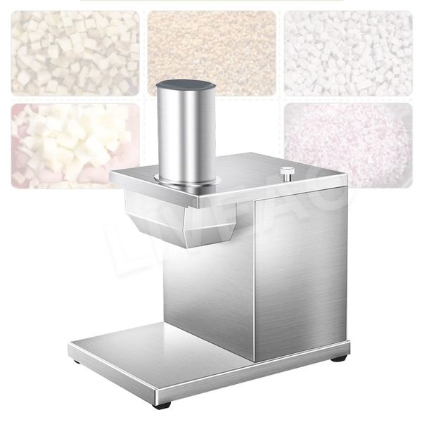 Tabletop kitchen appliance for dicing fruits and vegetables into cubes, including carrots, potatoes, and onions