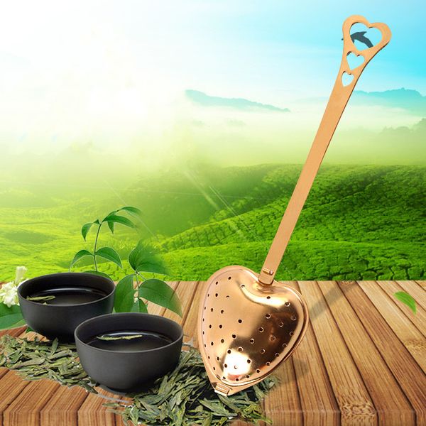 Tea infuser spoon with a heart-shaped stainless steel mesh strainer for filtering loose tea