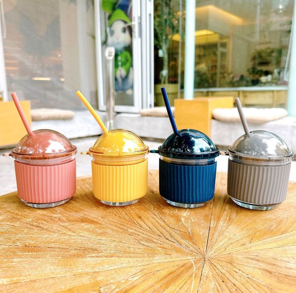 The newest 12oz egg-shaped glass coffee mug with straw, available in various designs and customizable with any logo