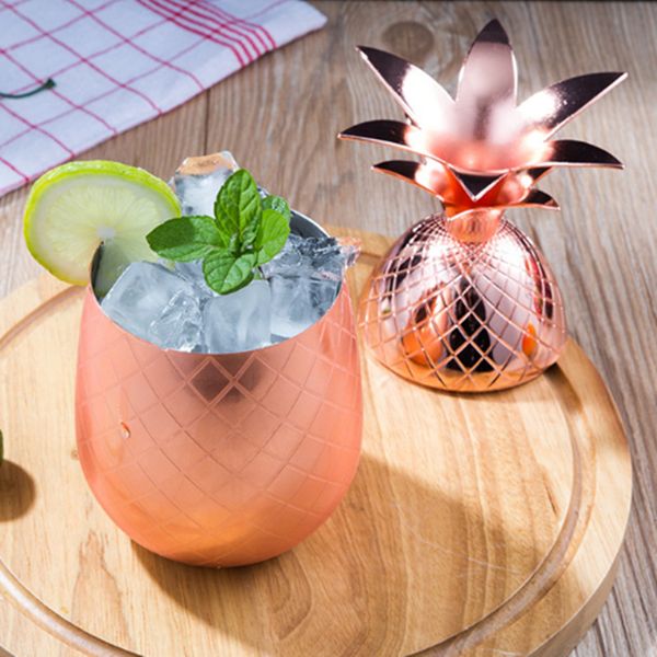 Tumbler and stainless steel mug cup in rose gold, gold, and silver colors for drinking