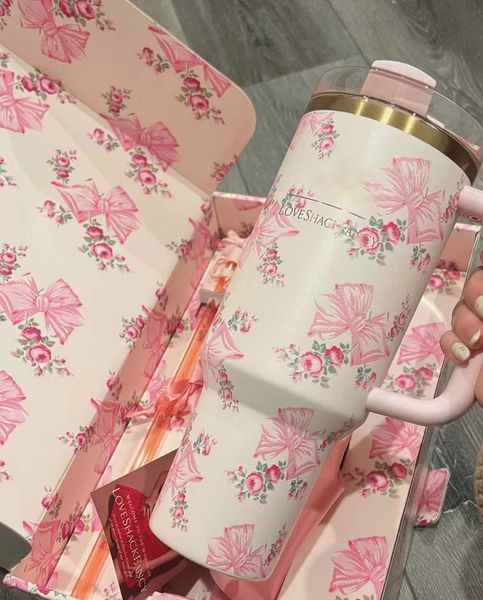 US stock Hot Water Bottles 40oz Stainless Steel Pink Rose Tumblers with handle Lid And Straw Travel Car Mugs Rosa Beaux blue Cups GG1118  

重写为：  
40oz stainless steel travel mugs with pink rose design, handle, lid, and straw in blue color, US stock item GG1118
