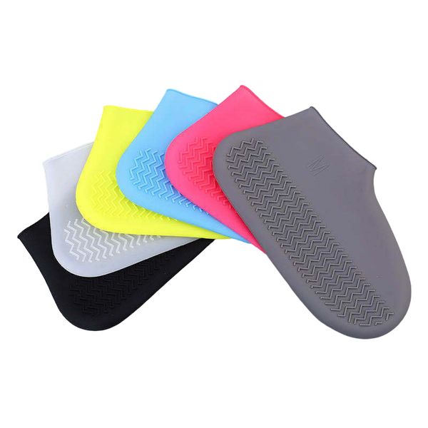 Waterproof unisex silicone rain boots with slip-resistant soles for indoor and outdoor use in wet weather
