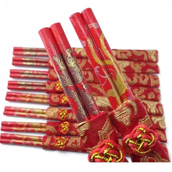 Wooden retro-style Chinese chopsticks with dragon and phoenix prints, perfect for weddings and souvenirs